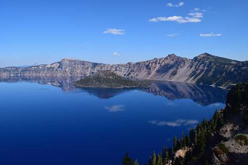 crater lake national park aerial photography of body of water mountain